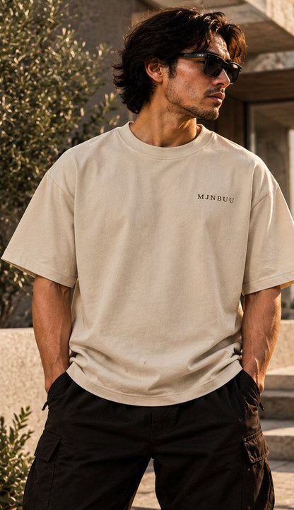 Model wearing the beige Root Rise Grow Tee, front